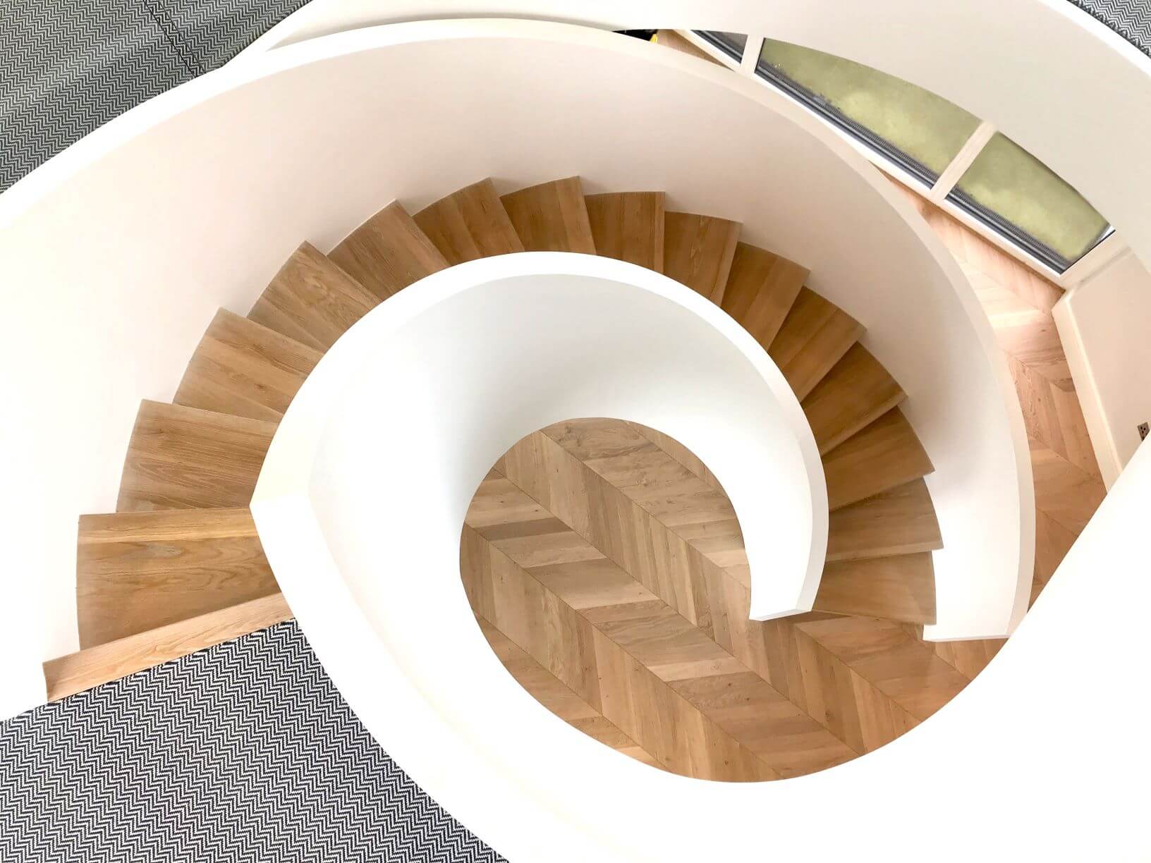 Curved Concrete Stairs with Curved Glass Balustrade Concrete Stairs